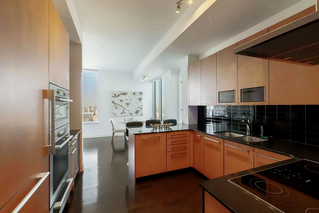 1 Bedford Rd Suite 2503 Toronto Yorkville Luxury Condos For Sale Kitchen Overlooks Large Family Room Den 1 Bedford Rd Suite 2503 Toronto Yorkville Luxury Condos For Sale Kitchen