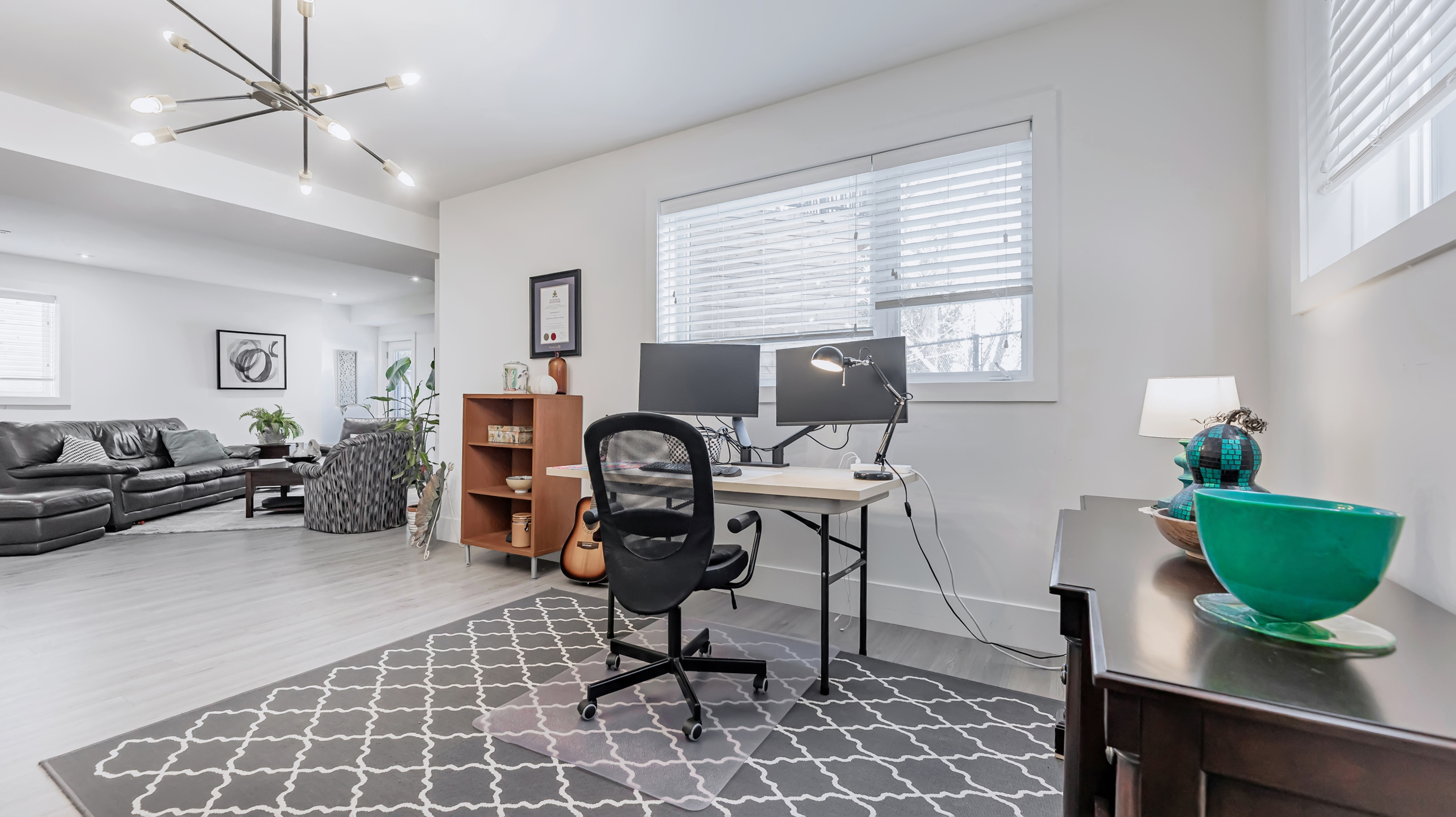 Basement open concept rec room and study room with 9ft ceiling and above grade windows