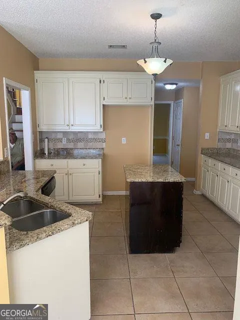 7031 COATSWORTH Drive