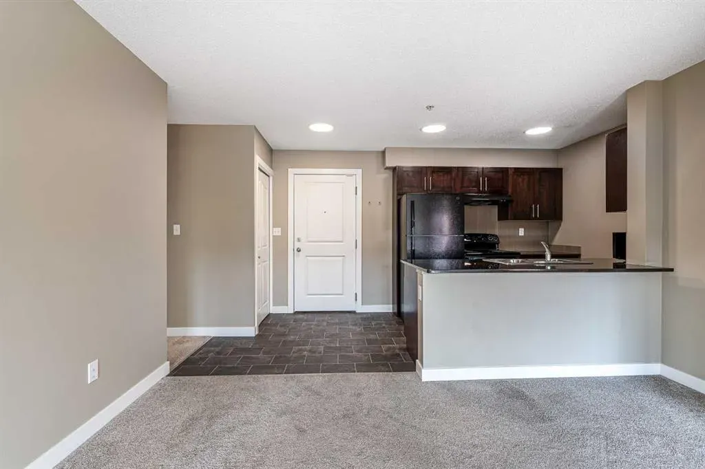 403 Mackenzie Way SW, #1407
