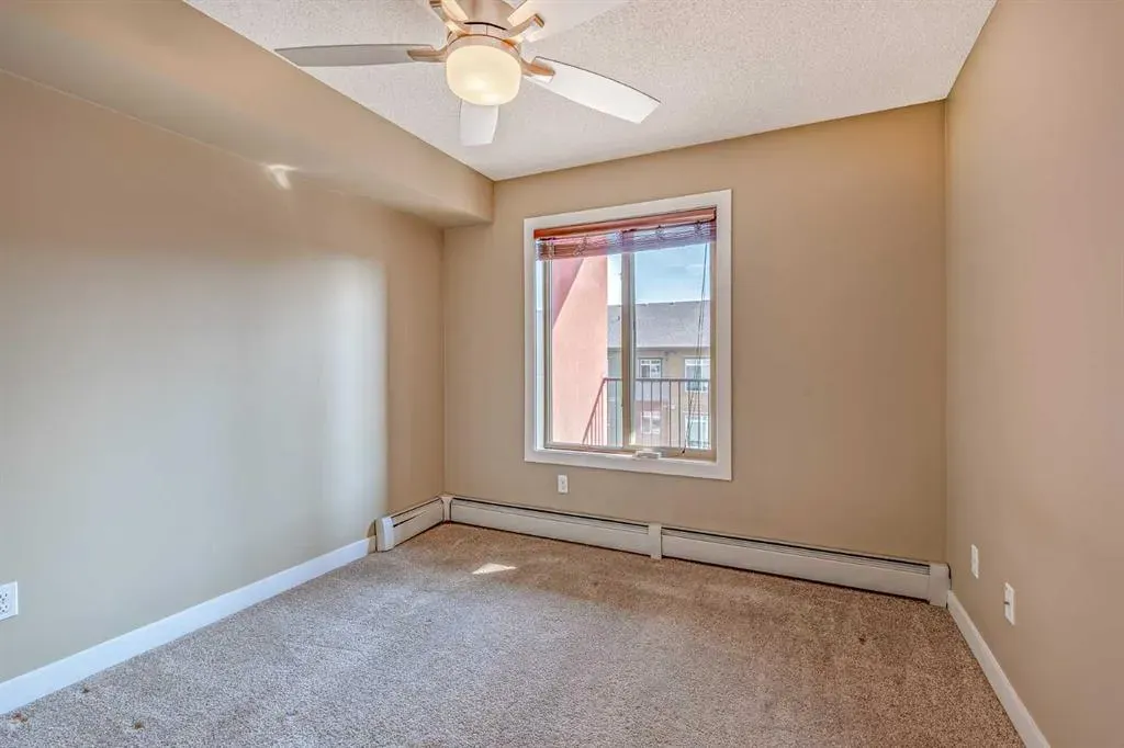 403 Mackenzie Way SW, #1407