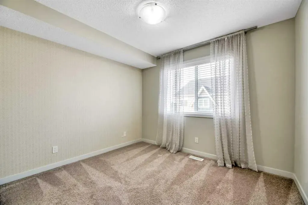 32 Red Embers Parade NE, #104