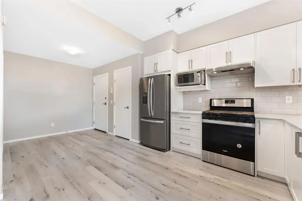 335 Redstone Walk NE, #203