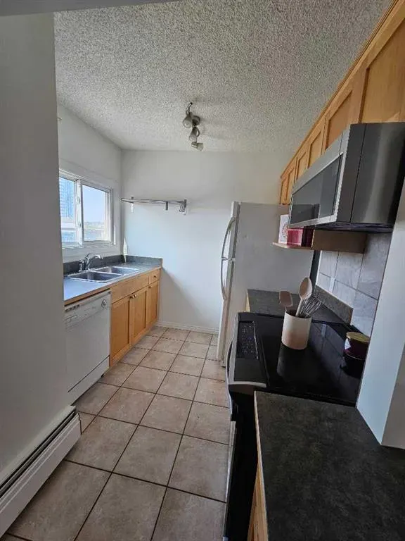 1334 12 Avenue SW, #704