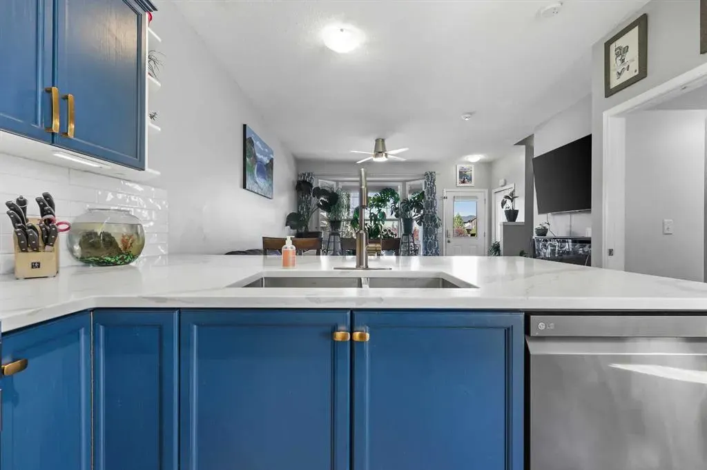 703 Luxstone Square SW, #403