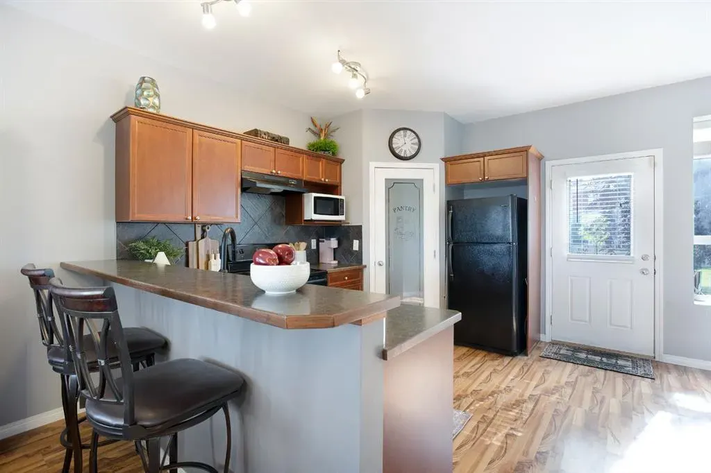 703 Luxstone Square SW, #404