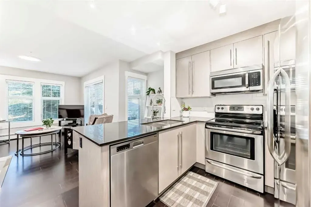11 MAHOGANY Row SE, #2103