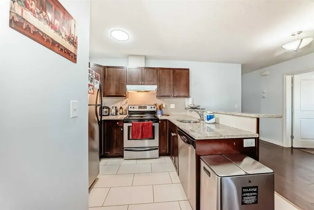 7716 bowness Road NW