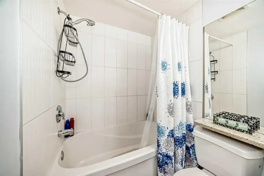 7716 bowness Road NW