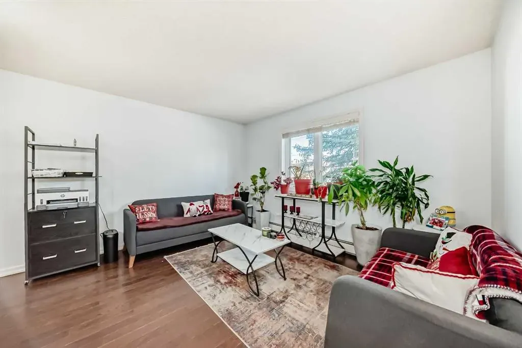 7716 bowness Road NW