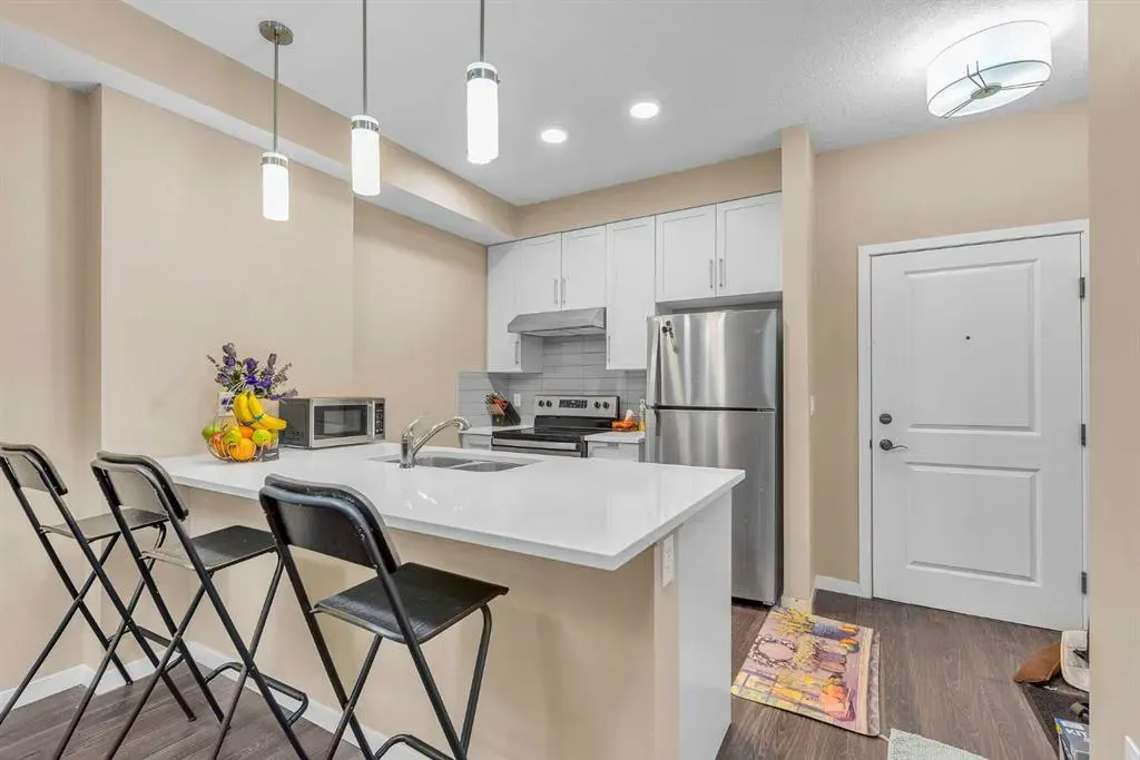 20 Mahogany Mews SE, #104