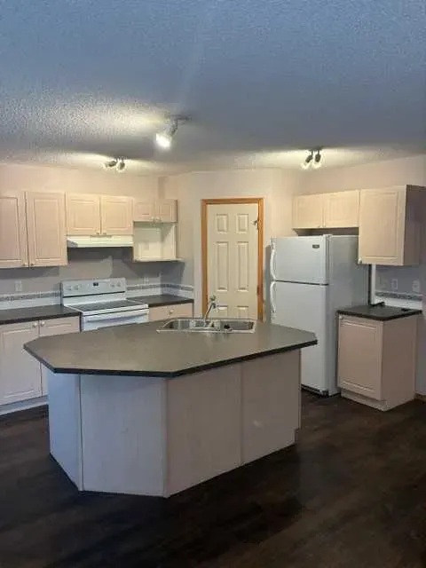 140 Tuscany Ridge View NW