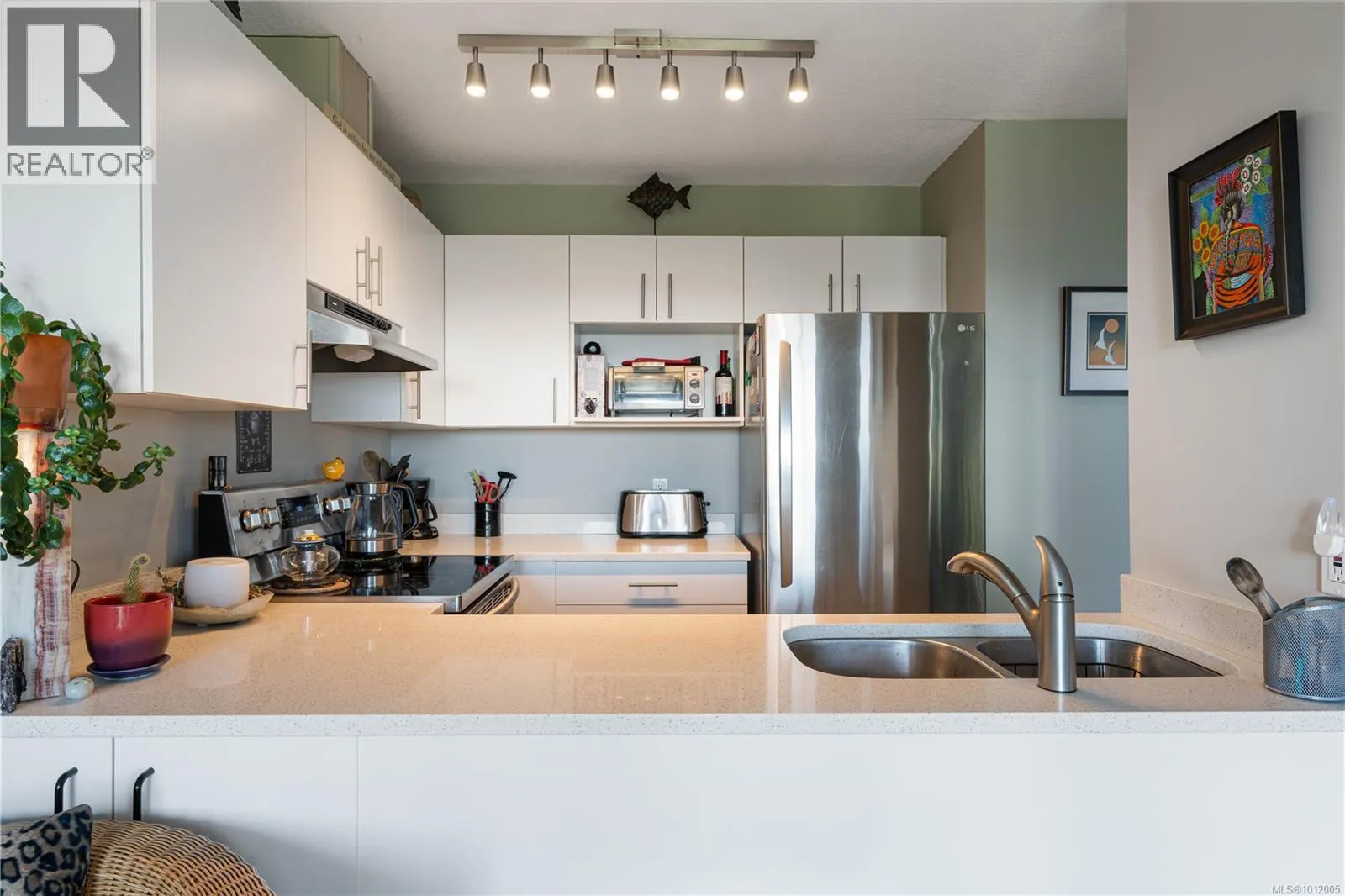 304 9916 Daniel St