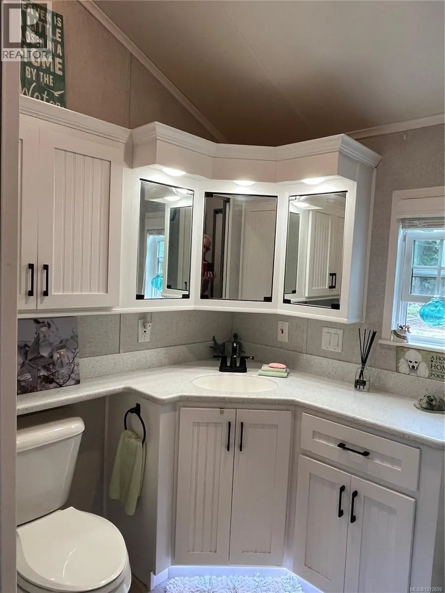 83 1142 Woss Lake Rd