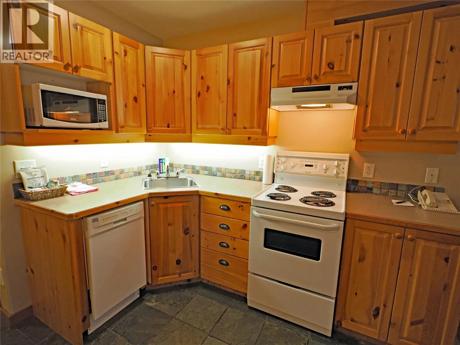 5335 Big White Road Unit# 303/305