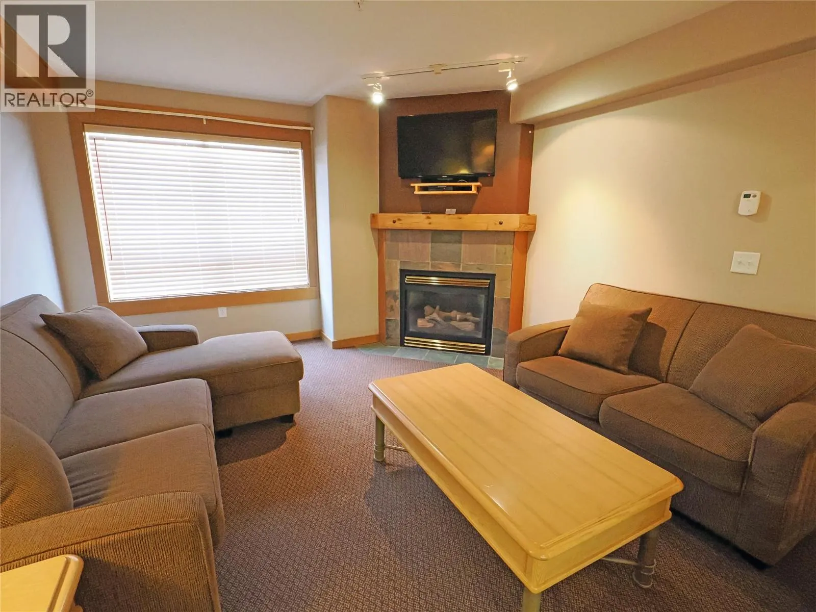5335 Big White Road Unit# 303/305