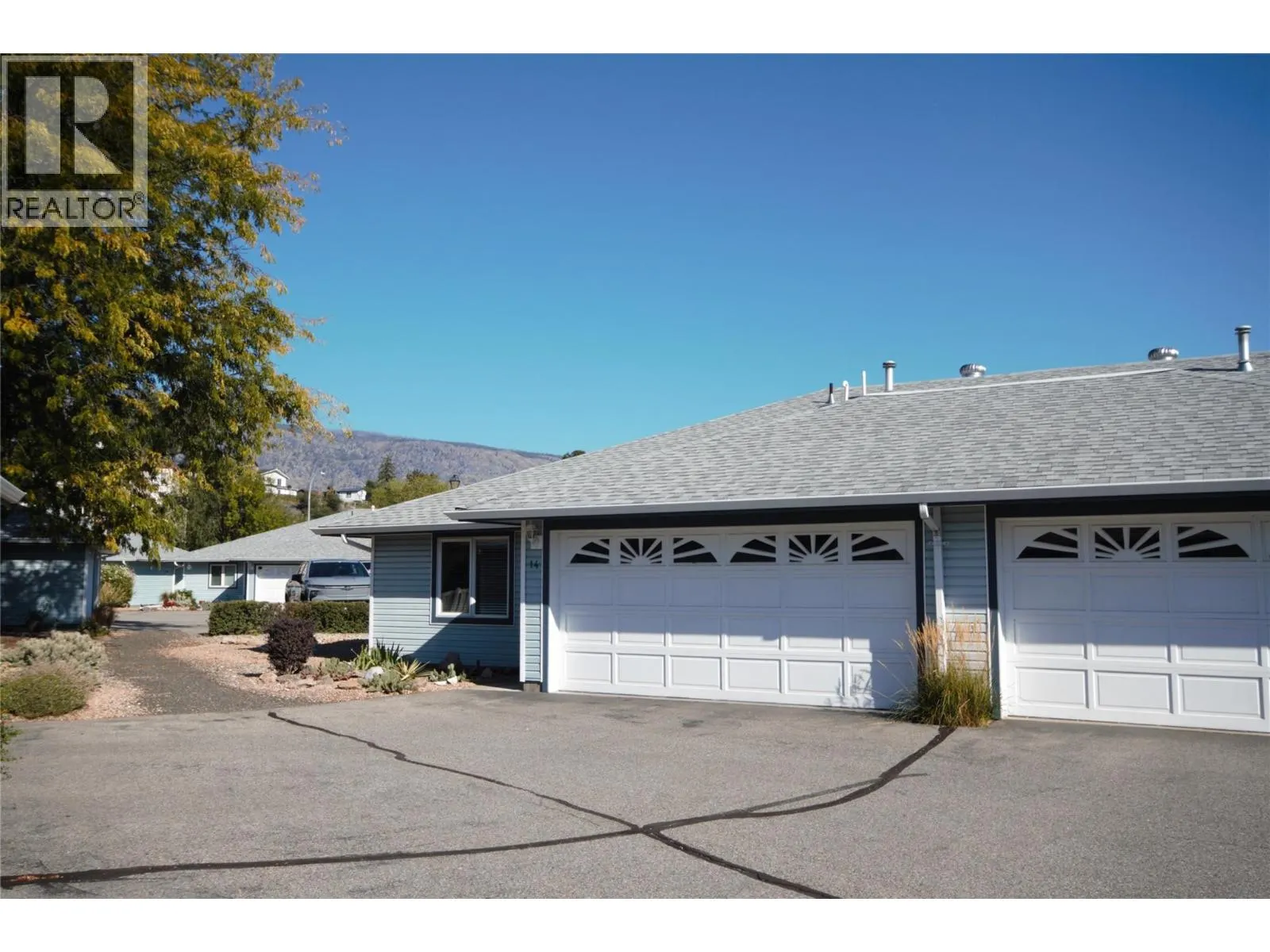 6446 MEADOWS Drive Unit# 14
