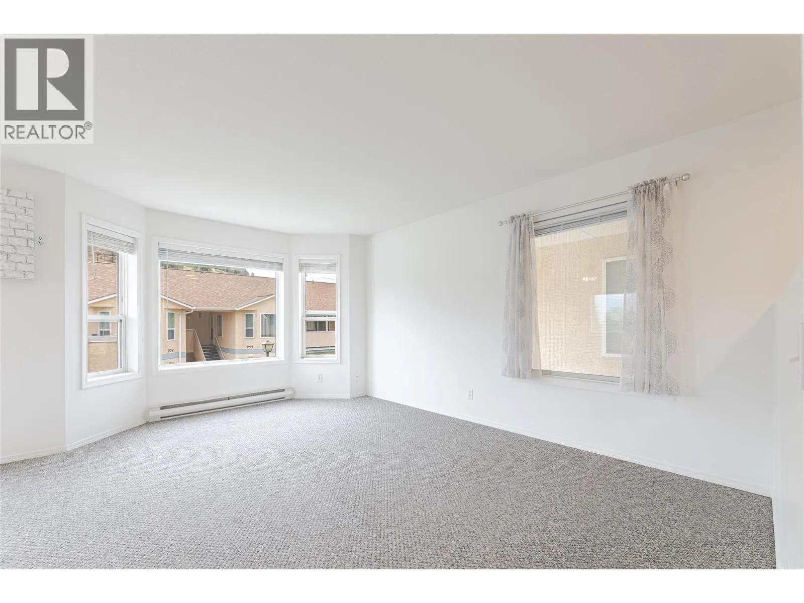 13014 ARMSTRONG Avenue Unit# 208