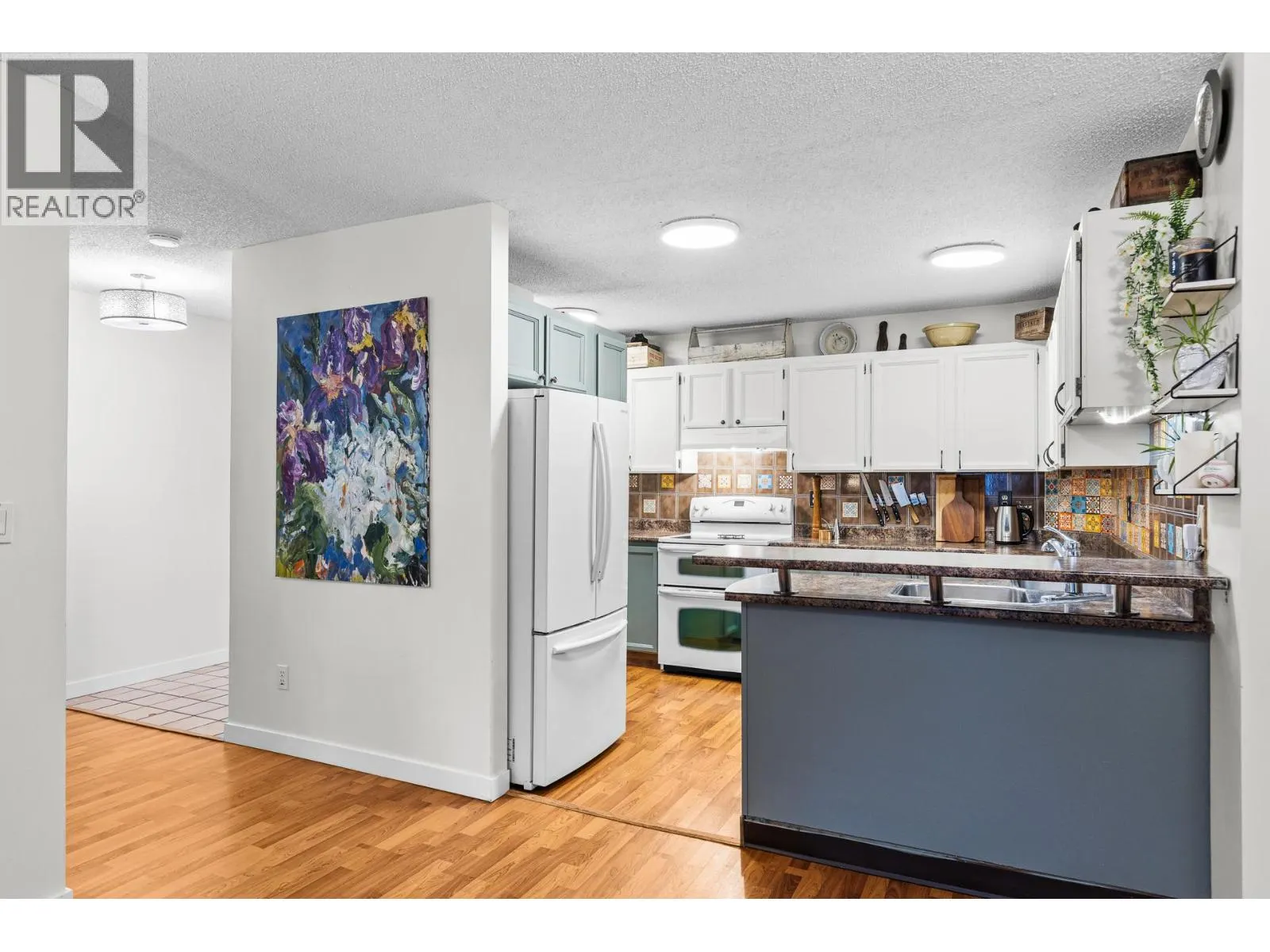 983 Bernard Avenue Unit# 210