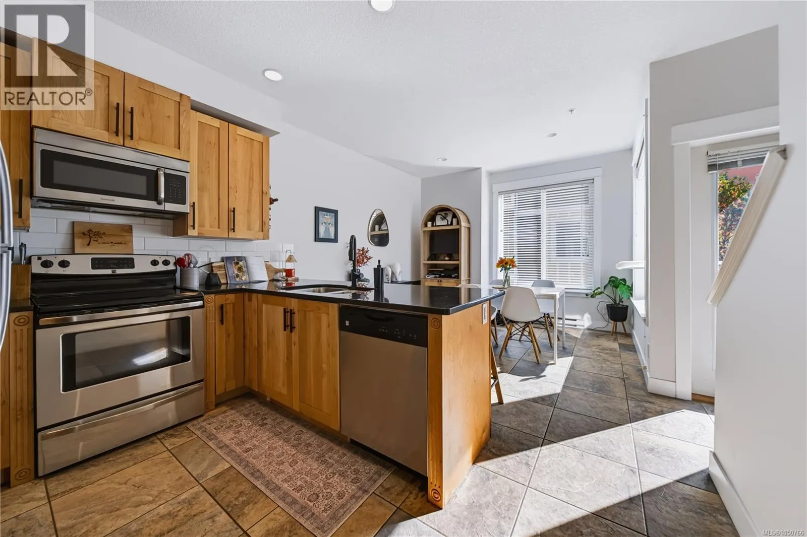 102 6057 Doumont Rd