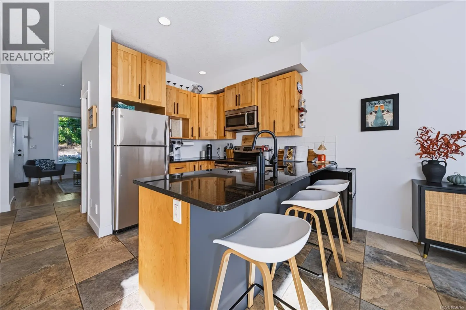 102 6057 Doumont Rd