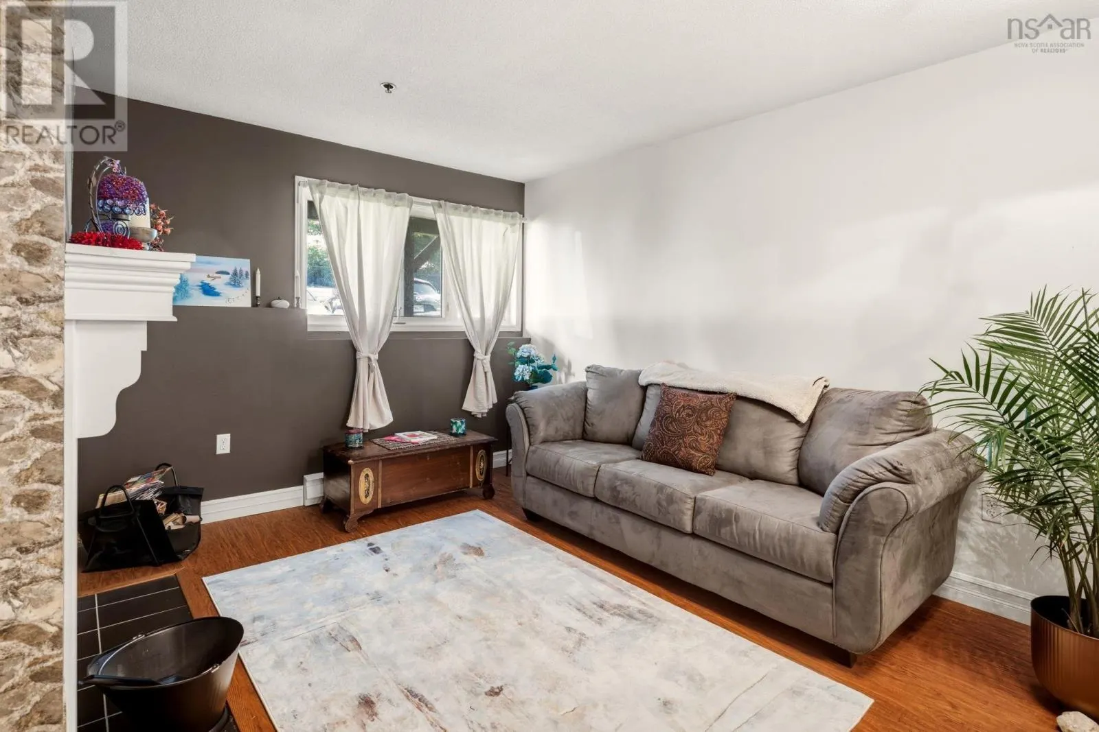 208 3700 John Parr Drive