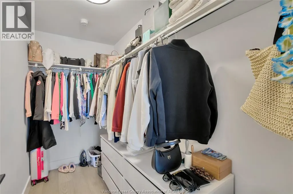 14400 TECUMSEH ROAD East Unit# 402