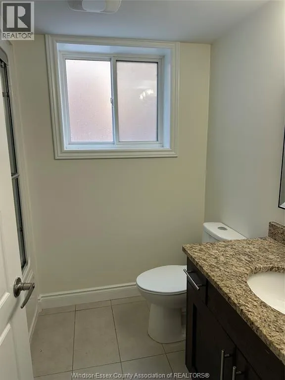 1136 EASTLAWN Unit# LOWER