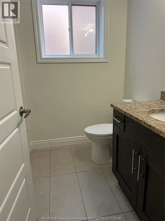 1136 EASTLAWN Unit# LOWER