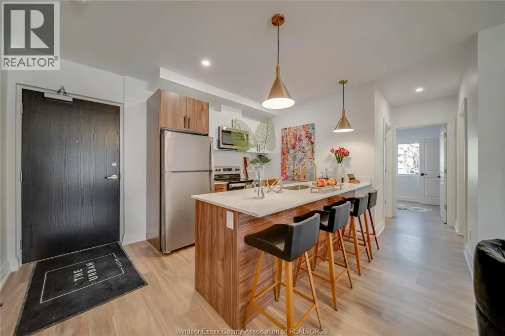 11957 TECUMSEH ROAD East Unit# 303