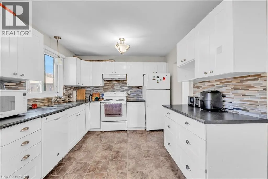 105 HANSEN Road N Unit# 102, #102