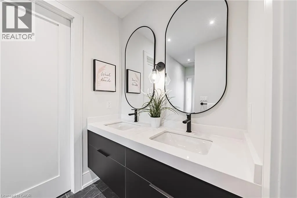 202 QUEEN Street W
