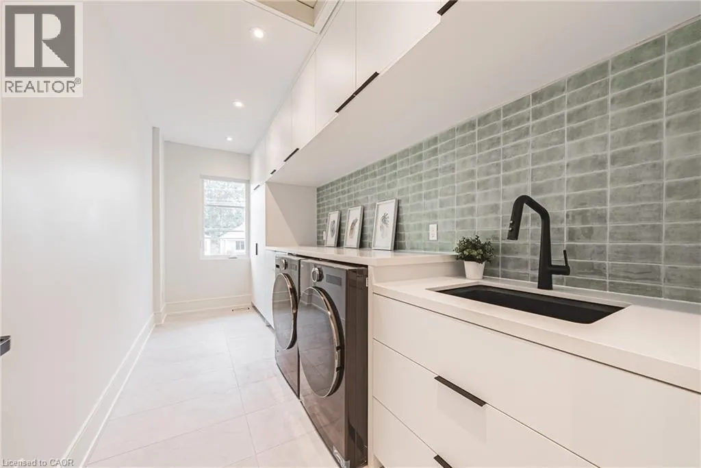 202 QUEEN Street W