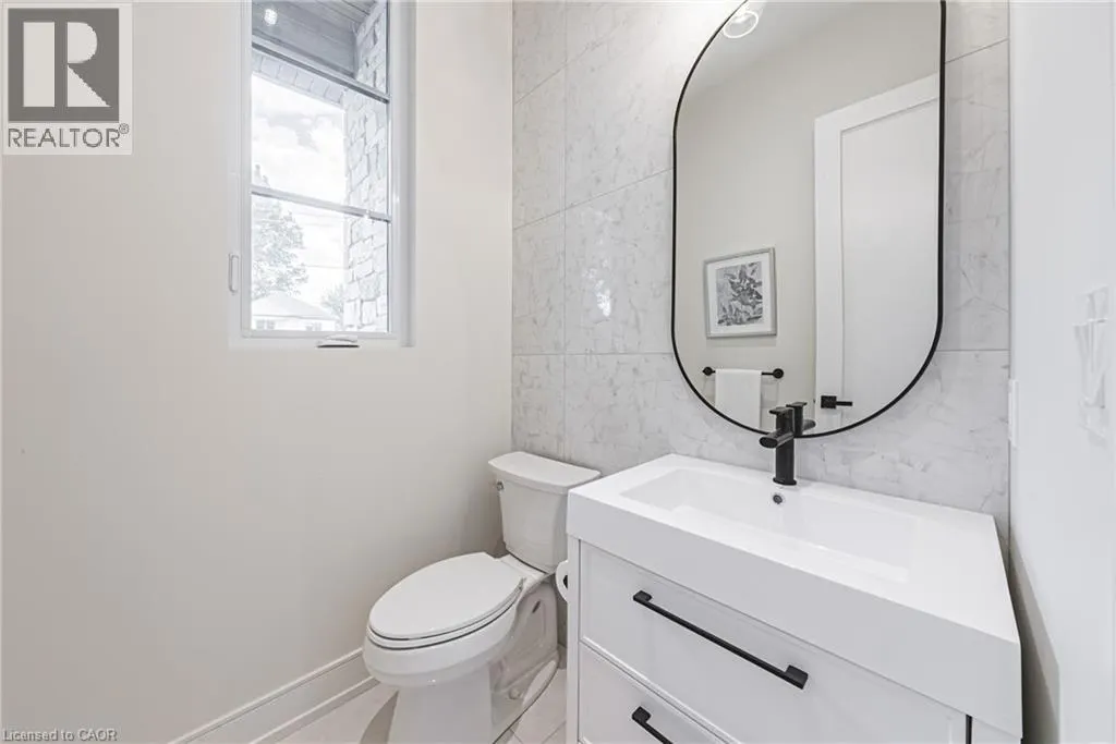 202 QUEEN Street W