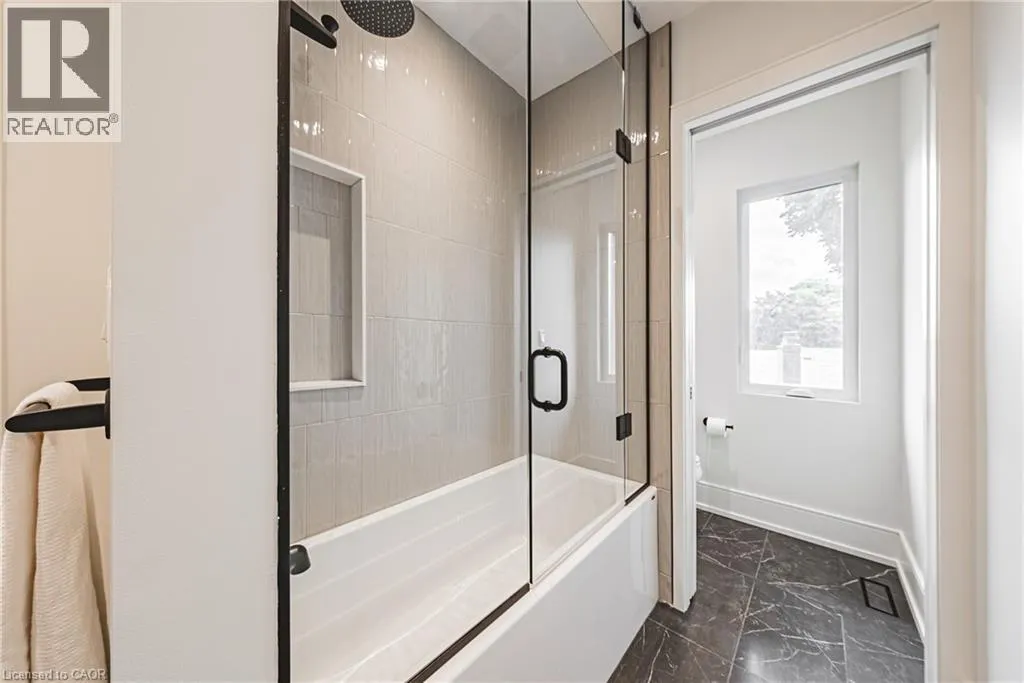 202 QUEEN Street W