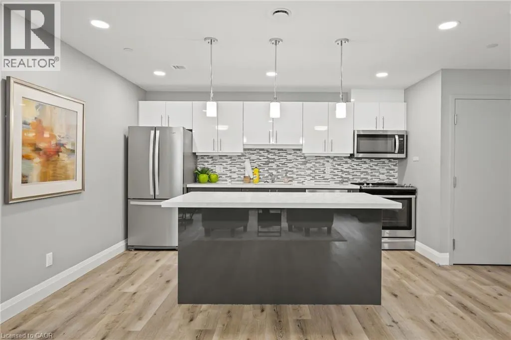 399 QUEEN Street S Unit# 202, #202