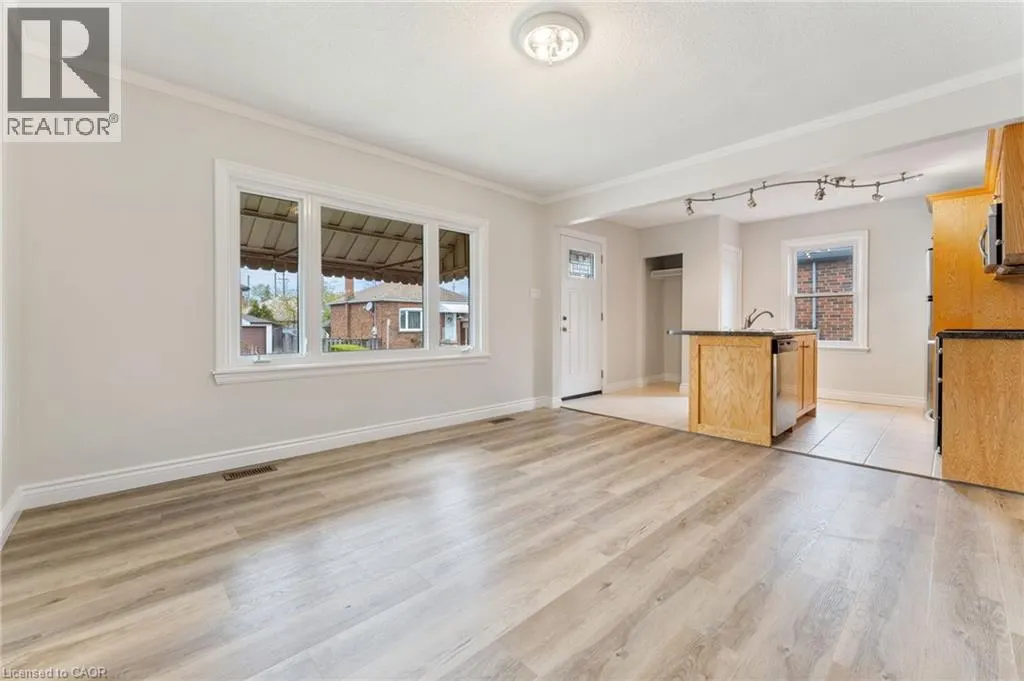 65 EAST 11TH Street Unit# Main Floor, #Main Floor
