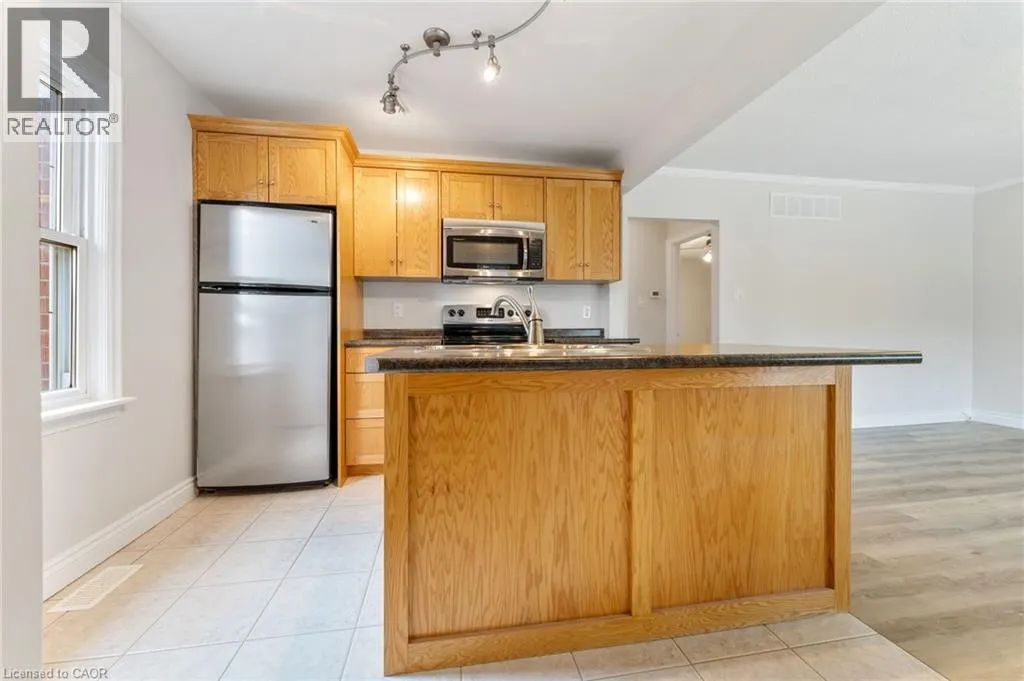 65 EAST 11TH Street Unit# Main Floor, #Main Floor