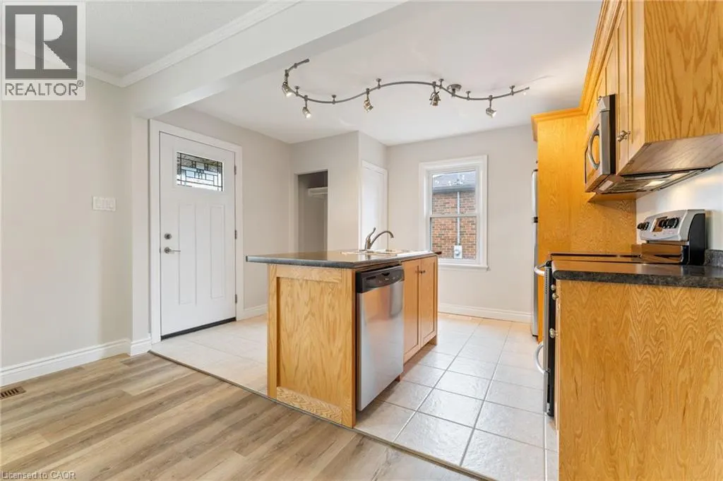 65 EAST 11TH Street Unit# Main Floor, #Main Floor