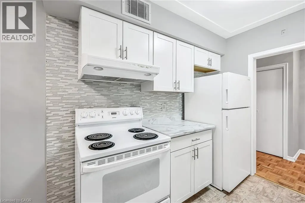 11 WOODMAN Drive S Unit# 103, #103