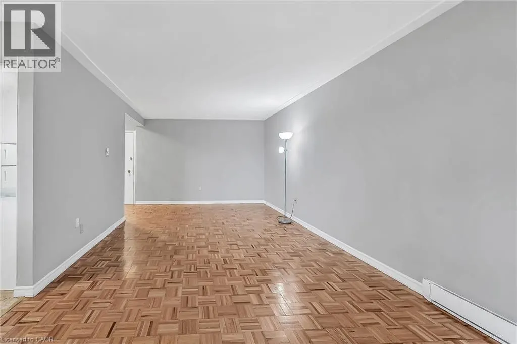 11 WOODMAN Drive S Unit# 103, #103
