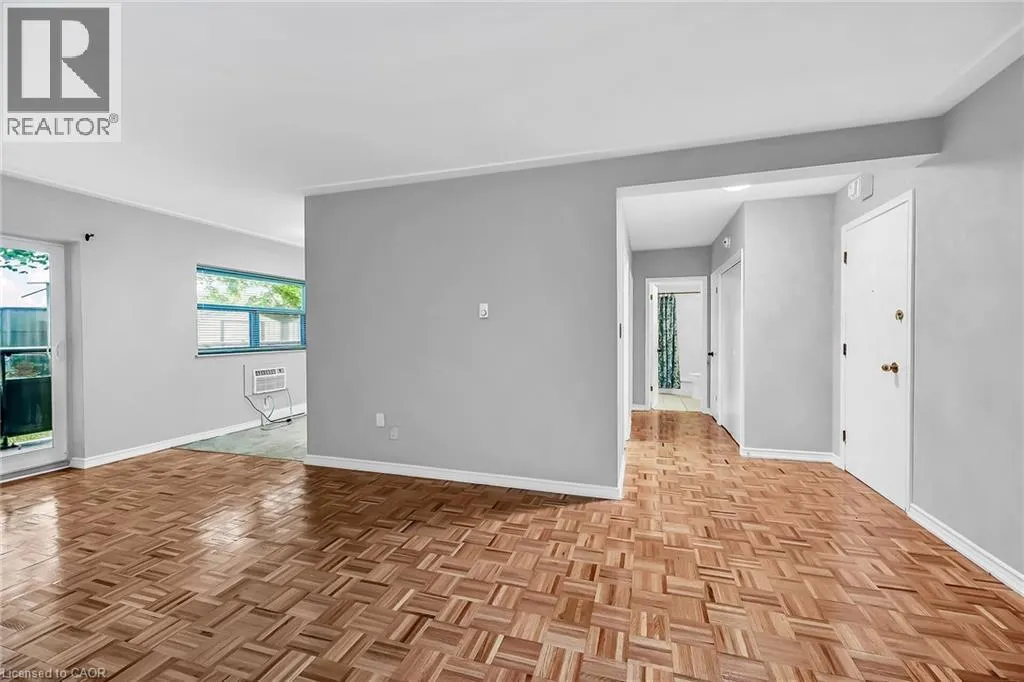 11 WOODMAN Drive S Unit# 103, #103