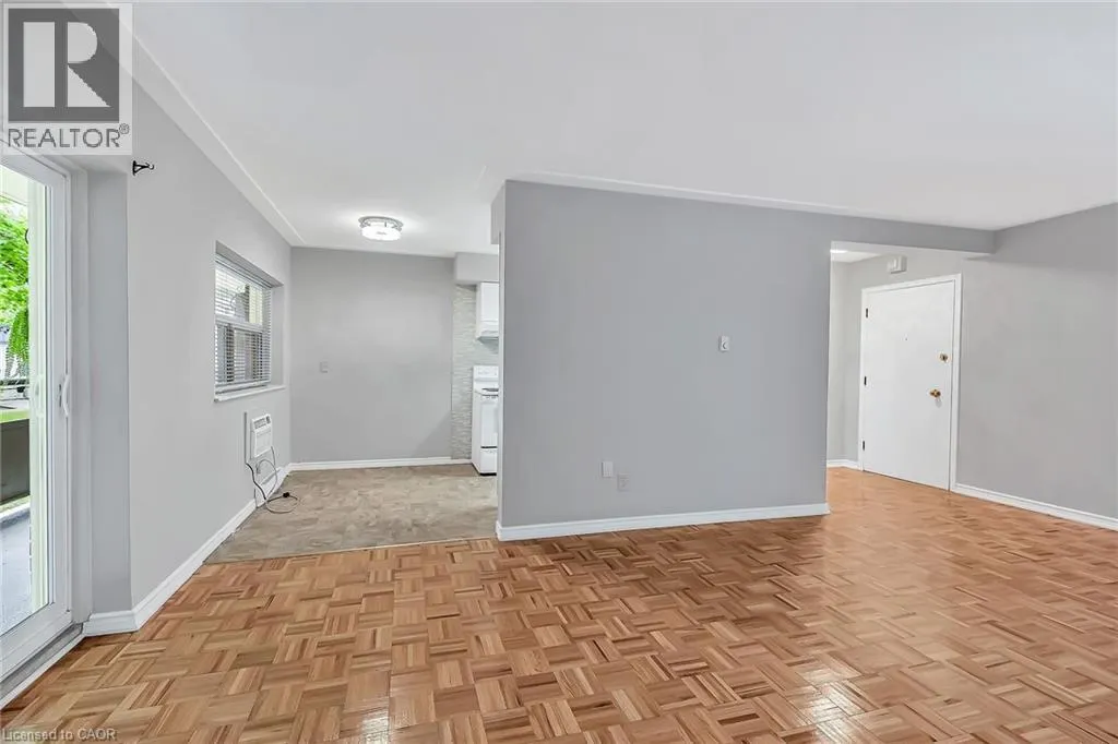 11 WOODMAN Drive S Unit# 103, #103