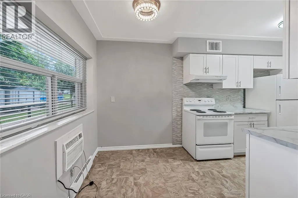 11 WOODMAN Drive S Unit# 103, #103