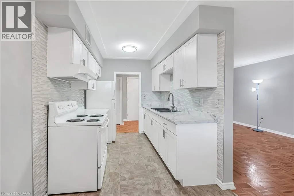 11 WOODMAN Drive S Unit# 103, #103