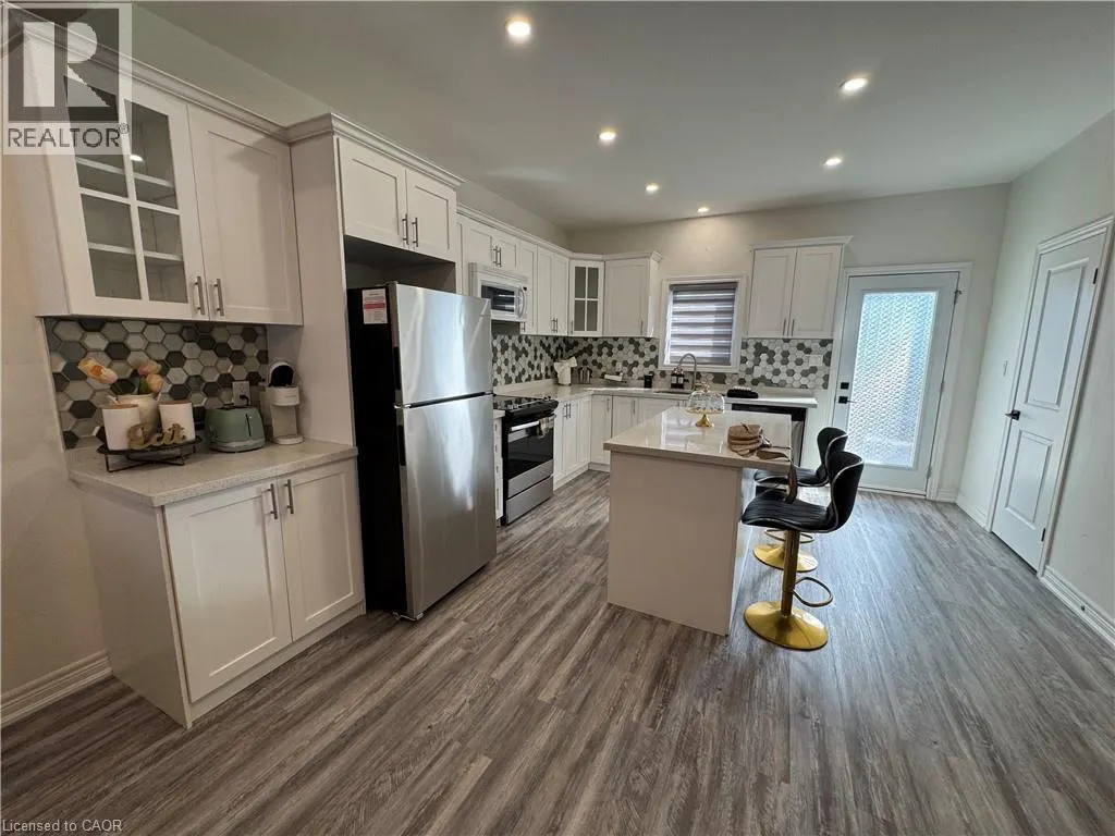 8196 MCLEOD Road Unit# 2 Upper, #2 Upper