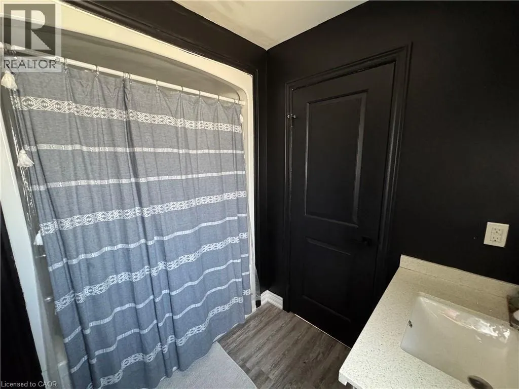 8196 MCLEOD Road Unit# 2 Upper, #2 Upper