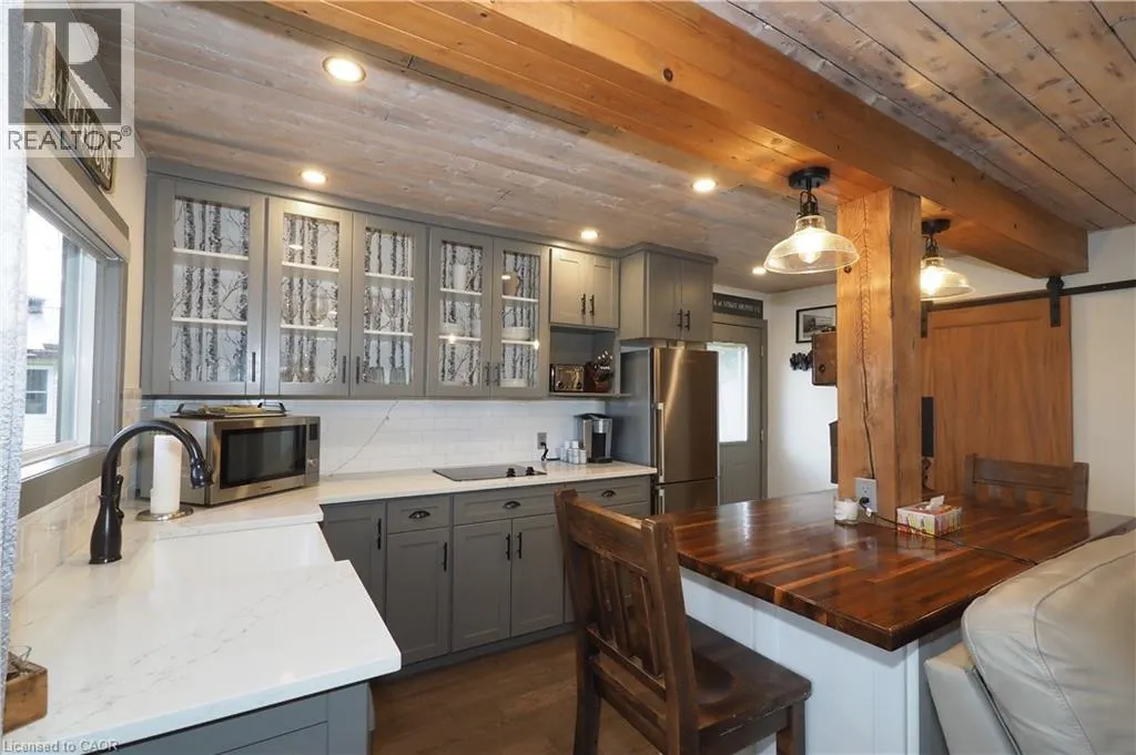 1323 QUEEN Street Unit# Cottage 111