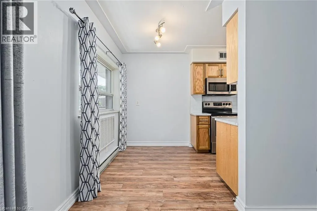 11 WOODMAN Drive Unit# 203, #203