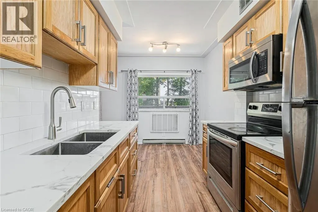 11 WOODMAN Drive Unit# 203, #203